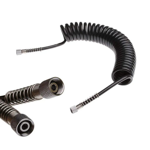 Heavy Duty Flexible Polyurethane Recoil Air Hose Featuring Automatic Snap Back Retrieval And Rock Solid Kink Resistant Build For Hassle Free High Flow Pneumatic Air Delivery In Any Workshop Setup, showing coiled structure and connectors.