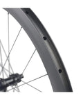 Close-up of 700C Carbon Disc Wheelset 38mm Clincher Road Bike Wheels Centerlock With Sapim Spokes showing rim detail