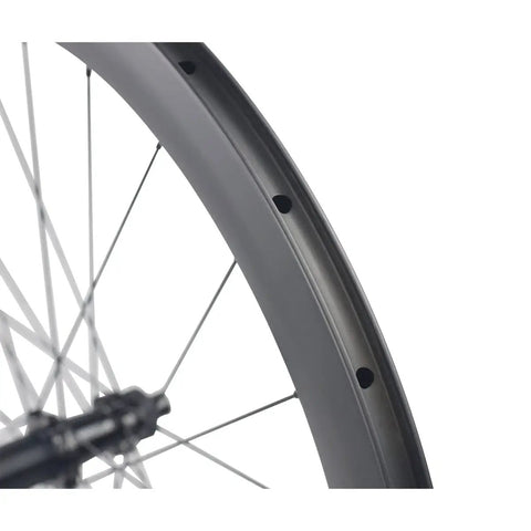 Close-up of 700C Carbon Disc Wheelset 38mm Clincher Road Bike Wheels Centerlock With Sapim Spokes showing rim detail