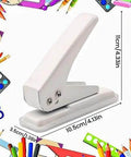 White single hole punch with measurements; ideal for crafts alongside colorful paper, scissors, paint and stationery.