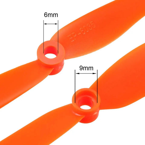 Close-up of Orange Nylon RC Propellers 6x3.5 Inch Two Vane Fixed Wing For Airplanes Toy With Adapter Rings showing adapter sizes.