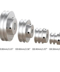 Heavy Duty Aluminum Alloy Double Groove Pulley 30mm OD 11mm Fixed Bore V Shape Wheel next to three larger pulleys