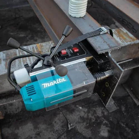 Makita HB350 1-3/8-inch magnetic drill mounted on steel beam with blue body and black handles.