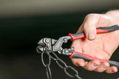 8 Inch Mini Bolt Cutter With Chrome Moly Steel Construction And Induction Hardened Blades in use cutting chain