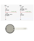Force Sensitive Resistor MD30-60, 30mm white circular disk with black interdigitated grid; front view.