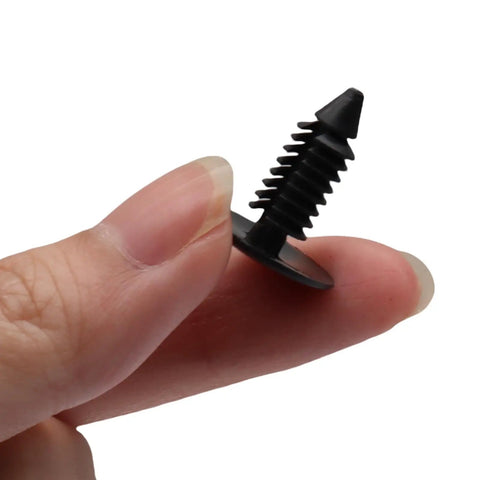 Built Tough Plastic Push Rivet Clips For Auto Bumper Fender Trim Panels Universal Seven Millimeter Snap Fit No Sweat Install Rock Solid Hold Durable Black Two Hundred Pack held in a hand.