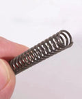 Durable Black Compression Springs For Heavy Duty Applications Plus 1Mm Wire Diameter And 18Mm Outer Diameter 50Mm Long Length With Tight Coil Construction in hand