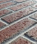 Close-up of brick surface treated with Top Shelf Concrete Water Repellent Sealer 5 Gallon Water Based Silane Siloxane.