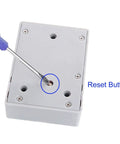 Detail of reset button on Rfid Electronic Cabinet Lock For Wooden Drawers And Cupboards Gray with screwdriver installation.