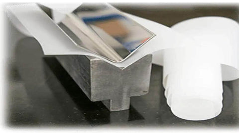 Two Inch By Zero Point Zero One Five Inch By One Hundred Foot Urethane Die Protection Film For Press Brake Jobs with metal part