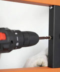 Installing Orange Lumber Storage Rack, 3-Level System, using durable sheet metal screws and heavy-duty tools in workshop
