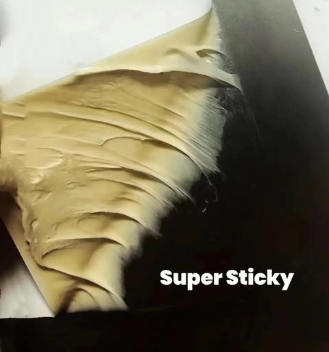 Close-up of RV Sealant Tape 2 Inch By 16 Foot Waterproof Butyl Tape With Fluorocarbon Film showing sticky texture.