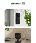 Hella Smooth Two K Battery Doorbell Camera Kit With Sync Module Free Mini Cam Plus Head To Toe Clarity Easy Install Sweet Porch Guardian For Renters And Homeowners Black mounted on wall and table