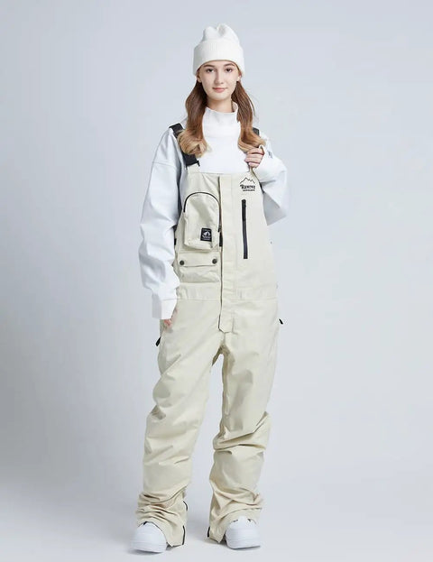 Person wearing Unisex Ski Bibs Waterproof Snow Overalls Warm Insulated Windproof Snowboarding Pants For Men And Women Outdoor Cold Weather Gear