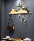 Sick Wall Mount Coat Rack with 5 Sturdy Hooks for Your Entryway Glow Up, mounted in stylish design, ideal for organizing bags and hats.