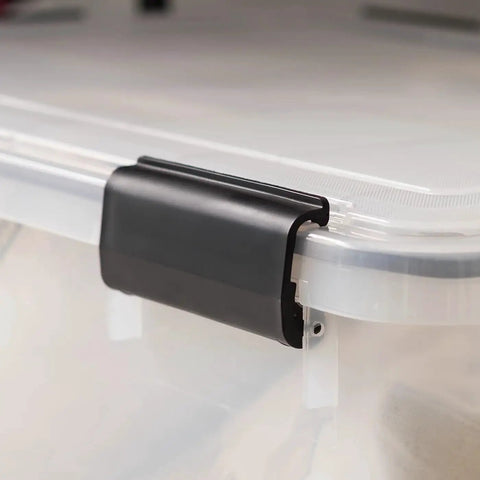 Close-up of black snap latch on Heavy Duty 62 Quart Storage Tote With Secure Seal Lid And Six Rugged Snap Latches.