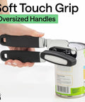 Heavy Duty Stainless Steel Smooth Edge Manual Can Opener And Bottle Opener With Oversized Handheld Turn Knob Soft Comfortable Handle Multifunction Kitchen Tool Us Designed Black in use on a can