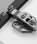 Soft Close Cabinet Hinges Set For Half Overlay Frameless Cabinets, slick stainless steel hinge in focus, mounted on cabinet