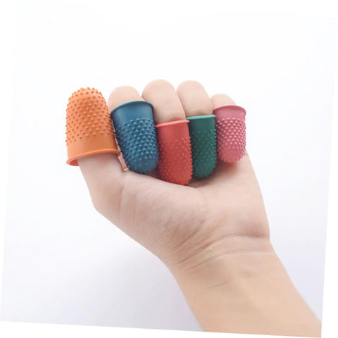 Hand holding five colorful neoprene finger sleeves from the 30 Pack Neoprene Finger Sleeves Heat Resistant Protective Covers With Non Slip Grip Durable Work Gear For Mechanics No Sweat Protection For Tough Industrial Job Sites.