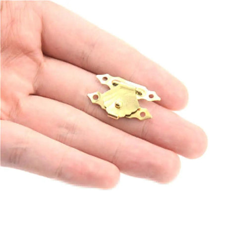 Hand holding Retro Vibe Mini Antique Iron Hasp Lock Set For Jewelry Boxes And Small Wooden Cases, 10 Pack Buckle Latch Hardware
