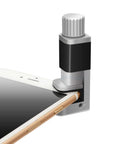 4 Piece Adjustable Screen Fastening Clamp Set holding iPhone screen for repair, showing clamp attached to device corner
