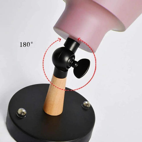 Close-up of adjustable Nordic Style Wall Light Sconce Lamp E27 Copper Edison Look with Macaron Finish Iron and Wood Bedside Reading Light.