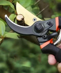 Pro Grade Titanium Bypass Pruning Shears With Dual Blade Titanium Coating And SK5 Steel Core Ergonomic Wavy Non Slip Grips in use