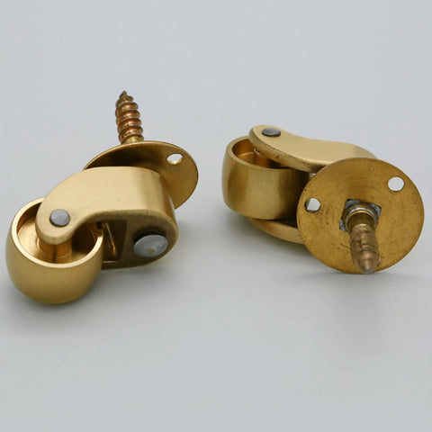 Hella Smooth 360 Swivel Brass Caster Wheels With Slick Vintage Style Built Tough For Heavy Duty Furniture Rollers Simple Bolt Attach Design Handles Two Hundred Kilos Like A Total Champ Daily, showcasing golden brass design.