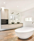 Modern bathroom with freestanding tub and recessed lighting suitable for 6 Inch Fresnel Glass Shower Light Lens With White Trim