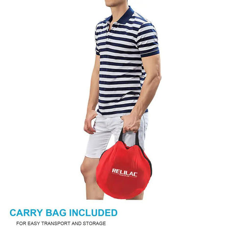 Person holding carry bag for Pop Up Golf Chipping Net For Indoor And Outdoor Practice, Backyard Target System To Help You Dial In Short Game, Multiple Targets And Pockets For Progressive Swing Training, Great Gift For Men Women Dad Husband Kids Golfers