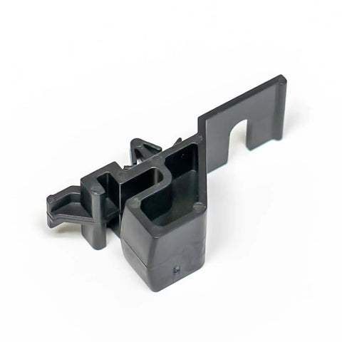 Black plastic connector from Full Storage Drawer Slide Hardware Kit With Two Rear Slides And Four Front Slides for cabinet use.