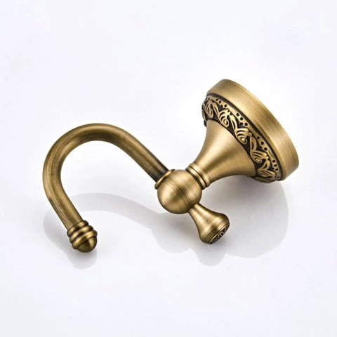 Robust Antique Brass Wall Mounted Coat Hook Single Rustic Hat Rack Fits Kitchen Entryway Or Bathroom Elegant Purse Hanger Rock Solid For Tight Spaces Daily, showcasing detailed design.