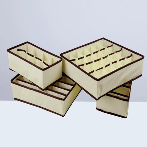 Super Slick Non Woven Drawer Dividers Keep Bras And Underwear Super Tidy In This 4 Piece Lingerie Closet Storage Set displaying beige panels.
