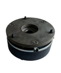 Front view of circular holding brake assembly for servo motor; dark metal housing, central bore, four screws.