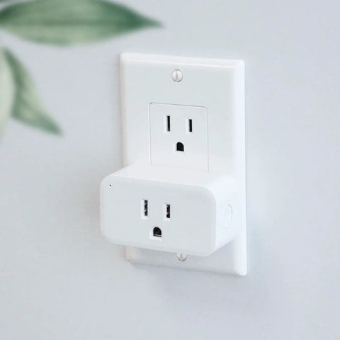 Smart Plug 4 Pack 15A Outlet With Timer Function And Zigbee Repeater ETL Certified plugged into wall socket