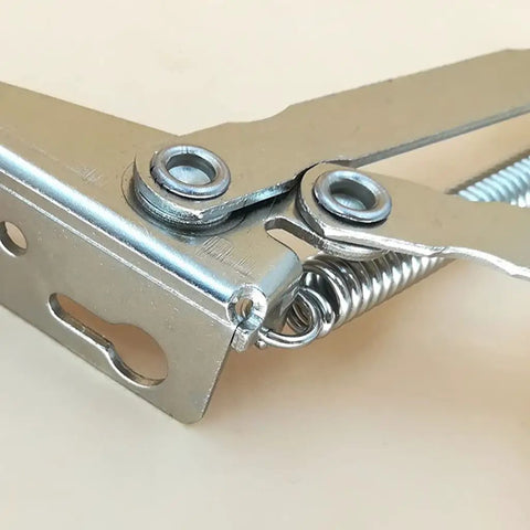 Close-up of metal Two Pack Folding Sofa Bed Spring Hinges 80 Degree Lift Support with nickel finish for cabinets and doors.