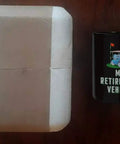 Sweet Retirement Ride Golf Cart Coffee Mug In 15 Oz Black Ceramic next to packaged item on wooden surface.