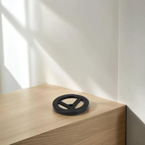 Indoor Fire Hydrant Hand Lever Valve Replacement Wheel on table, black iron handle, sturdy and durable design.