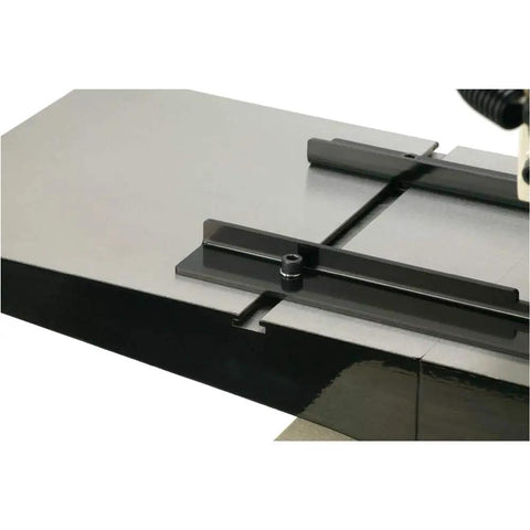 Close-up of the cast iron table of the Badass Two Hp Planer Molder With Stand And Power Feed 220 Volt Woodworking Beast.