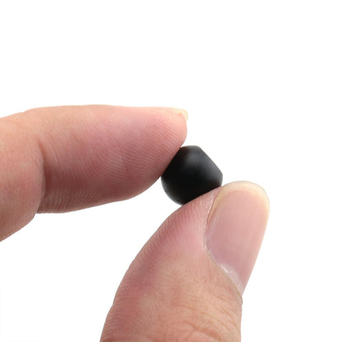 Heavy Duty M4 Threaded Cap Nut Knob For Ball Lamp Decor And Tough As Nails Furniture Lighting Fixtures Built To Last Carbon Steel Rust Resistant Hardware For DIY Projects Ceiling Mounts And Decorative Hardware 9mm Cap Diameter With 2.5mm Hole. Close-up of a black carbon steel threaded cap nut knob pinch-held between fingers.