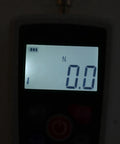 Portable Digital Force Tester With Aluminum Alloy Frame Push Pull Dynamometer Ranging From 20 To 200 Newtons Great For Material Mechanics Product Development Lab Testing And On Site Quality Control. Display showing 0.0 N