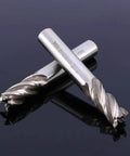 Two silver 4-flute HSS end mill bits with straight shanks for CNC routing.
