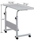 Adjustable standing computer desk dimensions 15.75" x 31.5", white chipboard top and steel legs, features rolling wheels.