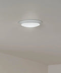 Horizon 7.4 Inch LED Downlight Ceiling Light 3000K White, Sleek Dimmable Modern Fixture, mounted on ceiling, emits warm light.