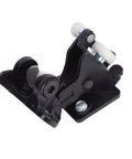 Close-up of black metal truck door hinge roller with white nylon wheels