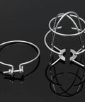 Heavy Duty Iron Cage Guard Universal Fire Sprinkler Head Protector Set showing two silver iron sprinkler cages for protection.