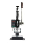 Top Tier Desktop Manual Arbor Press Rig Built Badass For Leather Crafting Riveting And DIY Hacks With Quick Spring Return Cast Iron Precision Platform on black base with digital display.
