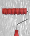 Solid 7 Inch Grain Pattern Rubber Paint Roller For Home Office Wall Decoration Tool with red textured cover on wood background.