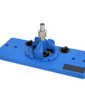 Blue plastic hinge boring jig for cabinet doors with 35mm hole opener; includes drill bit and wrench.
