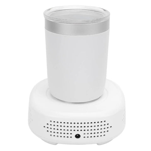 Keep Your Daily Sips Fresh And Hot With This Smart Dual Mode Coffee Mug That Effortlessly Heats Or Chills Drinks To Custom Temps For Laid Back Vibes Or Busy Grind, white electric mug on base.